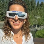 Candace Nelson Instagram - ⏮️ Throwback to the solar eclipse of 2017 🌒 It was a perfect day in Sun Valley without a cloud in the sky, and we were lucky to be in the path of totality. I remember everything getting very quiet and cool - almost chilly - on this hot August day. It became progressively dark and as the sun slipped behind the moon entirely, a cheer erupted from a neighboring watch party, echoing across the valley. It was a magical and awe inspiring event. Who is excited to watch today? ✋🏻 Ps: why do eclipse glasses have to be so goofy looking? #solareclipse #solareclipse2024 #familytime #candacenelson #entrepreneurwomen