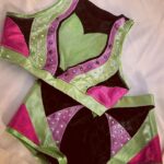 Candice LeRae Instagram - When I started wrestling I couldn’t afford gear. My Mom knew how to sew & I asked her to make gear for me. I’d buy fabric and she’d work her magic. After a couple years of helping and watching her, I learned how to make it myself. I’ve made my own gear for the majority of my 20 wrestling career. Including all of my gear I ever wore in NXT (excluding some sweet sets of entrance wings and vests). Well… now I’m a Mom. I want to be present with Quill and Pawdmé when I’m home from work. I didn’t think I’d be able to design or make myself new gear anytime soon. Johnny surprised me and has some designed by @davenpoe and made by @maineventgear AND…. It’s Maleficent inspired. I did add a little pixie dust and a hidden Mickey (for my fellow Disney nerds out there). It was an absolute “Cinderella going to the ball” set of gear. 💙🤍✨