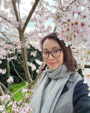 Candy Yuen Instagram - Sakura sakura~ was singing this Japanese folk song the whole time at the park. The song was a compulsory piece for Hong Kong children to practice on the recorder and I only realised how the melodies are ingrained in my mind when I was looking for sakura🌸☺️ I arrived at 4pm, it was sunny with blue sky, lovely weather to take photos of the cherry blossoms. I walked around to look for the perfect powder pink blossoms, then the sky turned grey and started raining and it was quite cold and windy. After a long walk I finally found the blossoms near the entrance, I missed this little path on my way in! I didn’t planned on taking any selfies today but I couldn’t resist, the clouds of sakura create such a joyful and sparkling space 🌸🌸✨✨ #sakura #cherryblossom #spring #springflowers #park #london #londonlife