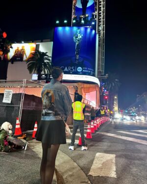 Cara Jade Myers Instagram - Anna, thank you so much for allowing me to be a part of this amazing journey and giving me the incredible honor of telling your story. ♥️♥️♥️ Our story from day 1 to Oscar’s 2024. 
I love you. 
Thank you to the @osagenation for being so incredibly kind, welcoming, and brave. Your story is so very important. 

Photo 1: Anna Brown jacket painted by Kiowa Artist Nicole Hatfield, with me outside the Oscar’s. 
Photo 2: They Kyle sisters. 
Photo 3: my first day in Pawhuska, OK. Osage Nation. 
Photo 4: the beautiful sisters @ruthshaw2906 & @toeshoes4ever giving me a blanket wearing tutorial. 
Photo 5: Me as Anna Brown 
Photo 6: @lilygladstone & I on set. 
Photo 7: Me as Ms. Anna
Photo 8:  The sisters @janaedawnnn & @_jilliandion 
Photo 9: photo taken by @redcorn in Pawhuska, OK summer 2021
Photo 10:  KOTFM premier week @chinesetheatres 2023.