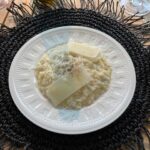 Cariba Heine Instagram - A year ago today, we had a most delectable meal cooked for us by Simon Jones. Very special day. Swipe for food shots. We had homemade foccacia and butter, mozzarella and tomato salad, cacio e pepe risotto, toothfish and butter beans, steak and a mind-blowing peppercorn sauce, "thrice-cooked" potatoes and delicious greens. Dessert was a chocolate cremeux with caramel, popcorn, raspberries and lime zest 🤤 10/10 menu.