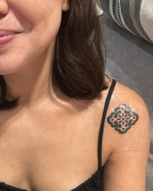 Carla Dunareanu Instagram - Waited nearly 2 years to finally get new ink! (Pregnancy and first year of breastfeeding) 

I had soooo many designs saved in Pinterest (😂😂) of things I wanted to do. But in the recent months when my Grandma’s health was deteriorating I knew I wanted something to symbolise her. Since I was born she’s the only grandparent I’ve ever had. 35 years of only THIS Grandma. So I know when she goes she’s going to leave a huge void. 

I saw @md.poke ‘s work last years and I’ve been following her on Instagram for a while always in awe of her beautiful and intricate designs. She was gonna be in Singapore for a guest spot at @feather.cloud.tattoo but unfortunately all her slots were snatched up. I still sent her a message just to tell her I was a big fan and I’d love to one day get tattooed by her. She told me she flies of on the 12th of March but she could come into the studio and do a tattoo for me. How on earth could I have said no???? I looked through her flashes and picked this one cause it reminded me of Peranakan tiles (my grandma is Peranakan) I wanted it to be symmetrical because my Grandma has always provided balance for the family, even if she had to raise 9 kids all on her own. The fact that it was a hand poke tattoo and I got to fully experience every single dot of ink into my skin made it 1000% more meaningful (and to answer your question, no, it didn’t hurt very much) 

My mum was gonna watch Peanut during my appointment but she had to suddenly go take care of my grandma. I was gonna cancel my appointment reluctantly but the best guy @sohnx (also an artist at @feather.cloud.tattoo ) offered to watch Peanut while I got tattooed. 

THIS is the kind of community people talk about. ❤️❤️❤️❤️ I loved every part of this experience. And I’m so thankful I get to tell the story every time someone compliments my tattoo. 

#tattoo #singapore
