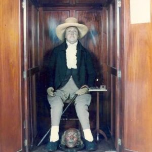 Carla Valentine Instagram - Life After Death.... Ahead of his time (that's not a pun - I've just noticed his head between his feet 🤦) Jeremy Bentham, born in London in 1748, devised the doctrine of utilitarianism, arguing that the ‘greatest happiness of the greatest number is the only right and proper end of government’. He was a major thinker in the fields of legal philosophy and representative democracy, and originated modern ideas of surveillance through his scheme for a prison called the Panopticon. He supported the idea of equal opportunity in education and his ideas contributed to the foundation of a major university here - University College London - the first institution in England to admit students of any race, class or religion and the first to welcome women on equal terms with men. Bentham’s ideas have tremendous relevance to contemporary society; engaging with his thinking helps us to understand better the world we live in today. Bentham was so progressive that when he died in 1832 he left his body to medical science (mostly organs and skin). He also requested that his skeleton be preserved and this ‘Auto-Icon’ as Bentham called it, pictured, was gifted to University College London in 1850 by Bentham’s surgeon. Today Bentham is displayed in UCL’s South Cloisters dressed in his own clothes and sitting in his chair.  As you can see from this picture, the head of the auto-icon is a model made from wax with glass eyes because the process of dessicating his real head went quite badly. You can see it between his feet though...! Now, the head has been moved to the Strong Room of the records department and can only be seen by special request. Many people have speculated as to exactly why Bentham chose to have his body preserved in this way, but whatever his true motives, the Auto-Icon will always be a source of fascination and debate, and will serve as a perpetual reminder of the man whose ideals inspired the institution in which it stands. 
#carlaween #halloweencountdown #halloween #humanremains #severedhead #skeleton #autoicon #jeremybentham #equality #equalopportunity #progressive #remains2beseen #london