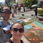 Carla Esparza Instagram - Semana Santa (Holy Week) in El Salvador 🇸🇻! The “street carpets” (alfombras) were a beautiful representation. It was heartwarming to see the village and small town where my husband did Peace Corps 20 years ago. It was wonderful to see the impact he made, and the surprise party the school threw him 🎉❤️🙏🏼 #semanasanta #alfombras #peacecorps #molineros #rainbowslide #sansalvadorvolcano