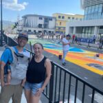 Carla Esparza Instagram - Semana Santa (Holy Week) in El Salvador 🇸🇻! The “street carpets” (alfombras) were a beautiful representation. It was heartwarming to see the village and small town where my husband did Peace Corps 20 years ago. It was wonderful to see the impact he made, and the surprise party the school threw him 🎉❤️🙏🏼 #semanasanta #alfombras #peacecorps #molineros #rainbowslide #sansalvadorvolcano