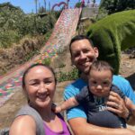 Carla Esparza Instagram - Semana Santa (Holy Week) in El Salvador 🇸🇻! The “street carpets” (alfombras) were a beautiful representation. It was heartwarming to see the village and small town where my husband did Peace Corps 20 years ago. It was wonderful to see the impact he made, and the surprise party the school threw him 🎉❤️🙏🏼 #semanasanta #alfombras #peacecorps #molineros #rainbowslide #sansalvadorvolcano
