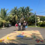 Carla Esparza Instagram - Semana Santa (Holy Week) in El Salvador 🇸🇻! The “street carpets” (alfombras) were a beautiful representation. It was heartwarming to see the village and small town where my husband did Peace Corps 20 years ago. It was wonderful to see the impact he made, and the surprise party the school threw him 🎉❤️🙏🏼 #semanasanta #alfombras #peacecorps #molineros #rainbowslide #sansalvadorvolcano