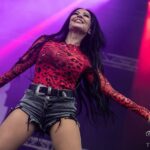 Carla Harvey Instagram – Here’s a picture of a girl in her happy place; unfortunately i won’t be in that happy place on the upcoming @butcherbabies Euro run. Love you all but i have to sit this one out! I have a history of problematic vision and I had to have a major surgery about 10 years ago in my right eye for a retinal detachment.  On our summer tour the telltale symptoms repeated themselves in my left eye. I’ve been hoping to avoid major surgery but it is clear that it must be done. My emergency surgery will include a healing process of laying face down for a number of days with a gas bubble in my eye. This is the first time in fifteen years i won’t be able to join my friends on stage but right now my health and sight take  precedence for me.  While I am gutted that I cannot make the tour the risk of me waiting till after a tour to do such a surgery is too great and includes permanent vision loss. The beauty of having two vocalists is that Heidi can cover for me until i’m better! Hoping to make it out for part of this euro run…go to the shows, have a blast and support my bandmates for me! I’ll see you soon! #butcherbabies