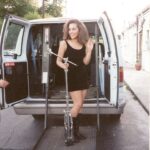 Carla Harvey Instagram - Here's a super fun throw back! I was in high school when i started my first band. It was actually a "spite" band because I had auditioned for the school talent show with some friends and since we weren't popular, we didn't get in. I thought, SCREW playing the high school auditorium, let's play REAL shows. Within 6 months my band, God's Girlfriend, was booking shows at places like the Ritz in Roseville and the Token Lounge, which is where I took this picture. My style hasn't changed much has it 🤣🤣Except we have better flat irons thirty years later 😂😂