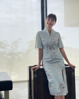 Carmen Soo Instagram - CNY day 3.
Clothes getting tighter and @tanfreeway has given up on dressing up 😄

My pretty dress from @doublewoot_fashion