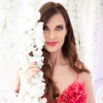 Carol Alt Instagram – Surround yourself with flowers 🌺  #dress by @marcbouwer #hair @eddiewunderlich  #photo @ezequieldelarosa