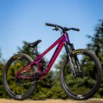 Caroline Buchanan Instagram - @cbuchanan68’s “Pink Zebra” Ticket S flying high and rolling fast at @crankworx Rotura This bike was a winning fan-inspired design from Caroline’s Colour-Line Buchanan coloring book and it’s an eye-catcher on the mountain 👀 📸 @maddogboris #trekbikes #trekticket #crankworxrotura #slopestyle
