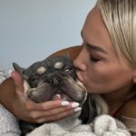 Caroline Buchanan Instagram - 🦥 Sloth mode @knobby • slothing with my dog “ MO” are my favorite mo-ments Xx #knobbynation #knobbyunderwear