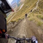 Caroline Buchanan Instagram - Hold on this iconic Queenstown trail with my @trekbikes team mates!! @r_doggystyles @finleykirsch @cbuchanan68 #pov #ruderocktrail #queenstown #newzealand #trekbikes