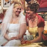 Caroline Rhea Instagram - This is a good one. It was my last day filming and @bethabroderick and I were laughing and crying in Sabrina’s bedroom(NO I HAVE BEEN CORRECTED IT WAS THE ONLY TIME WE EVER SAW HILDAS BEDROOM)I still have this wedding dress even though Stella ate most of the veil. I always thought it would be fun like in #thesisterhoodofthetravelingpants that this magical dress could fit anyone. Let me know if you’re getting married. Also please enjoy my hair which appears to be lacquered to my head but was very on point at the time @chezralphie . Those were fun days!!! #Bestwitches BTW @melissajoanhart killed on her first time on stage doing stand-up. A total natural . Made her Aunt very proud. #familybusiness #90s #tbt #sabrinatheteenagewitch #AuntHilda #standupcomedy #weddings