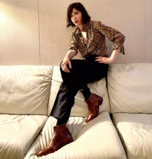 Carrie Brownstein Instagram - Brown boots on white leather couch.