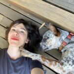 Carrie Brownstein Instagram - Banjo turns a year old today!! Or, his birthday might have been yesterday. Or possibly it’s July 3rd. This is the closest I’ve ever come to knowing the birthdate of a rescue dog. My older dog Cricket has a made-up birthday and she’s somewhere between the ages of 10 and 13, though she refuses to give me a straight answer. Respect. Either way, it’s Banjo’s birthday….week. So, some photos of him (and me, and his siblings, and Cricket, whose neck he likes to gnaw upon). Shout out to @pnwcattledogrescue for all you do. 🐶❤️