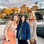 Carrie Brownstein Instagram - Had a blast directing the incredible cast and working with the amazing crew of #minx. Here I am as 1) proud ski-sweater-meets-pin-striped trousers-wearing homely friend of @opheliabits 2) getting dropped off on my first day of school with my cool, hot moms @lennonparham and @jessmarlo, and 3) cosplaying as a cast member the moment I’m off set. @ozzymo @idaravictor @mrjakejohnson @ellenrapoport @salted_lightly @hbomax @asblockhead