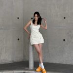 Carrie Wong Instagram - A pop of sunshine with #OTIGERSTRAP ☀️🧡 Effortless and feminine, the new #OTIGERbyOnitsukaTiger collection is available exclusively at Raffles City Mall and online at onitsukatiger.com/sg. @OnitsukaTigerOfficial @OnitsukaTigerSG #OnitsukaTiger #OnitsukaTigerSG
