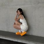 Carrie Wong Instagram - A pop of sunshine with #OTIGERSTRAP ☀️🧡 Effortless and feminine, the new #OTIGERbyOnitsukaTiger collection is available exclusively at Raffles City Mall and online at onitsukatiger.com/sg. @OnitsukaTigerOfficial @OnitsukaTigerSG #OnitsukaTiger #OnitsukaTigerSG