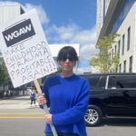 Casey Wilson Instagram - Strong signage and one baby, surprised we have to do this for fair wages. #wgastrong @jamiebuntbunt