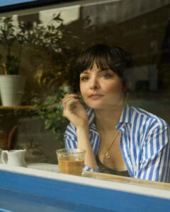 Cassady McClincy Instagram - This past weekend @oliviabeasleyphoto and I caught eyes through the window of a little cafe in east London as I was journaling with a coffee. We then had a spontaneous photoshoot and I am in awe of her gifted eye. Such a magical, synchronous meeting🫶🏼