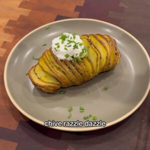 Cassie Yeung Instagram - okay I love potatoes in all forms but there’s something special about a hasselback potato 🥔 

Recipe ⬇️

Gold potatoes, scrubbed clean
1/2 cup (1 stick) butter, softened
1 Tbsp minced garlic
Herbs of choice, I used chives and parsley
Salt and pepper to taste

Preheat oven to 450 degrees Fahrenheit. 
Mix softened butter with garlic, herbs, salt and pepper. Roll into a log in Saran Wrap and set it in the fridge for at least 30 minutes. 

Place a potato in between two chopsticks or skewers and make thin slices (the chopsticks will prevent you from cutting all the way through). Drizzle generously with olive oil, season with salt and pepper and massage well. Bake for 30 minutes or until the slices begin to separate. 

Slice compound butter into thin slices, then break them up and place them between the potato slices. Bake for another 30 minutes (may take longer if your potatoes are larger). 

Serve with another slice of compound butter, sour cream and chives and enjoy!