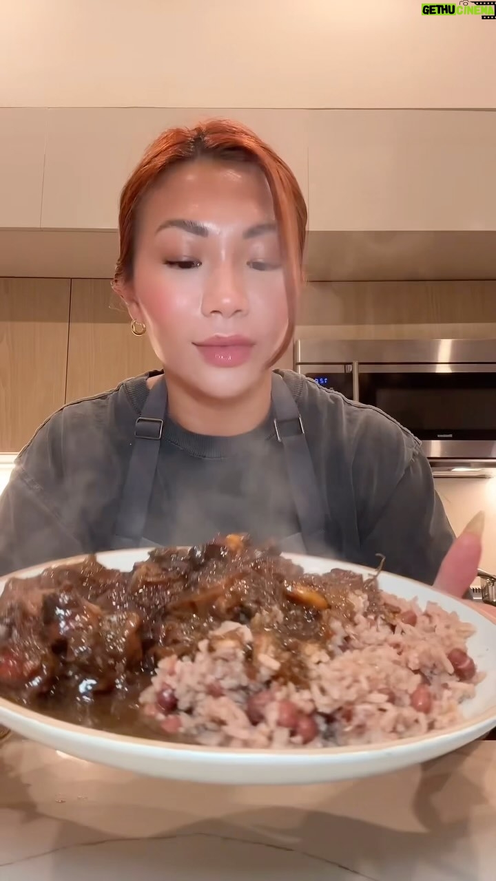 Cassie Yeung - 469.9K Likes - Left Jamaica and needed oxtail immediately
Recipe ā¬ļø this is how I made it but I am in no way trying to call this authentic š«¶š»šÆš²
3lbs oxtail
1 green bell pepper, diced
1 orange bell pepper, diced
1/2 yellow onion, diced
2 green onions
1 scotch bonnet or habanero, seeds removed & diced
1 Tbsp garlic, minced
1 Tbsp ginger, minced
4-5 sprigs fresh thyme
1 Tbsp garlic powder
1 Tbsp onion powder
1 tsp adobo
1 tsp allspice
Salt & pepper to taste
1 Tbsp browning sauce
2 Tbsp soy sauce
2 Tbsp brown sugar
4 cups beef broth or water
2-3 bay leaves
Whole scotch bonnet or habanero
1 can butter beans
1 Tbsp ketchup
Clean oxtail with vinegar, lime and water a few times until water is no longer scummy then dry well with paper towel. Add dry seasoning, browning, soy sauce, peppers, garlic ginger and thyme then mix well. Marinate in the fridge overnight or at least 4 hrs.
To a large pot, add brown sugar and caramelize. Sear oxtail pieces until they have a nice color (you may need to do this in a few batches so all the pieces touch the bottom of the pan). Remove to a clean plate. Add the veggies and marinade left behind and sautĆ© a few minutes. Add in beef broth or water making sure to scrape the bottoms of the pan. Bring to a boil then add oxtail back in along with bay leaves and scotch bonnet/habanero. Turn the heat down to medium low, cover slightly and cook for 3 hrs or until meat is fall off the bone tender. Add in a can of strained butter beans, ketchup and cook for just another few minutes. Serve with rice and peas ā¤ļø