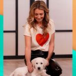 Cat Deeley Instagram - And they call it puppy love! 🐶🤍 Swipe left to pet our adorable Buddy, who’s currently being trained by @dogsforautism.🐾