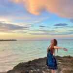Chandler Lovelle Instagram - This cloud will go down in history in my camera roll 🥲🌅 #travel #bahamas #summervibes #sunsetbeach #nofilterneeded #traveldestination #hopetown #actorslife #redhead #mermaid
