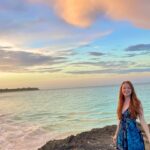 Chandler Lovelle Instagram - This cloud will go down in history in my camera roll 🥲🌅 #travel #bahamas #summervibes #sunsetbeach #nofilterneeded #traveldestination #hopetown #actorslife #redhead #mermaid