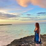 Chandler Lovelle Instagram - This cloud will go down in history in my camera roll 🥲🌅 #travel #bahamas #summervibes #sunsetbeach #nofilterneeded #traveldestination #hopetown #actorslife #redhead #mermaid