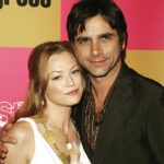 Charlotte Ross Instagram – #tbt We thought we’d give red hair a try 👩🏻‍🦰🤷‍♀️Jake in Progress with John Stamos on ABC. Anyone remember our wedding (on the run) storyline? 💍👰‍♀️ #redhair