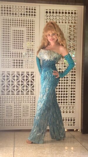 Charo Instagram - Hola Amigos I want to Share with You This Video Posing for a Fashion Magazine . I Hope You Like my Outfit Because I Did Not Eat Nothing For 3 Days . And took Two Wardrobe Ladies to Help me to Close the Zipper . Have Fun . I love You All . Besos  #charo #cuchicuchi #fun #music #pose #costume #blue #sparkela #hot #jumpsuit #summer #photographer #photshoot #dance #salsa #singing #dancer #magazine #fyp