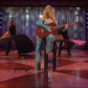 Charo Instagram - Hola Amigos l want to share with You This Spanish Momento Playing The Very Famous  Song : ESPAÑA CAÑÍ . I Hope You Like I. But l Really will Like to Know if You Like my Outfit Is Very Heavy all Cristal Beading My Sister make It and I Almost  Break The Stool
And My A……………S .
Happy Monday I love You  All .  Besos . #charo #cuchicuchi #music #guitar #guitarist #hot #sound #fyp #foryou #crystals #color #stylish #camp #design #bead #heavy #sexy #singer #sing #dance #dancer #salsa