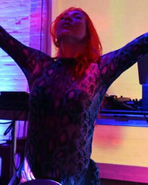 Chastity Ashley Instagram - Every victorious warrior draws their strength from the highest source; their love.
.
Such aaaaa moment out here on the road doing what I do to elevate you. Special thanks to the incredible souls of @secretdisco.society ya’ll know how to throw a party! Can’t wait to come back. 
.
#dj #drummer #percussionist #producer #beatmaker #worldtraveler #roadwarrior #redhead #neonpony