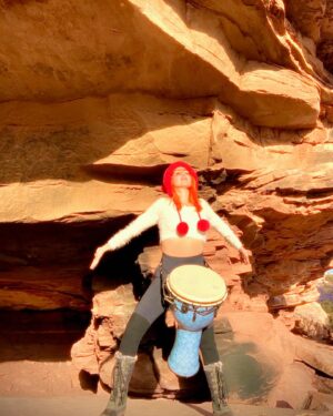 Chastity Ashley Instagram - Breaking boundaries is a sacred dance with the unknown—a journey within to unveil the limitless soul. Embracing the whispers of possibility. This is my dance. 
.
#BreakBoundaries #souljourney #dj #drummer #djembe #neonpony