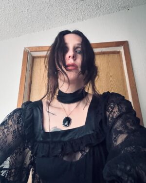 Chelsea Wolfe Instagram - the Murder Barn bathroom just gets me 

also, my first @batshevadress dress ! 
  @bloodmilk guardian necklace 🖤