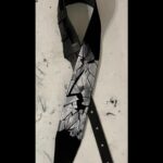 Chelsea Wolfe Instagram - enamored with new guitar strap made by Matt Kepler @cultofhades 🙏🥚 the egg is cracked, fractured photo by @theweary__traveler
