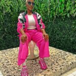 Cheryl 'Coko' Gamble Instagram - I have the right to remain stylish. 💖💫 @beeyeconic down to the socks! Tracksuit: @beeyeconic #tracksuit #stylish #over50fashion
