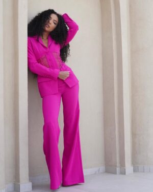 Cheslie Kryst Instagram - First she’s sour😼😼😼, then (swipe) she’s sweet 😬😬😬 .
.
.
.
#jovani #pinksuit #corsettop