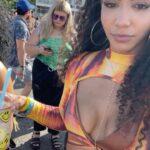 Cheslie Kryst Instagram - The four of us have mastered two things: curly hair and the light-skinned squint 😂😂 @page.salon @asa_kryst and @chanluxe flew to NYC this week so we could watch @billieeilish at @govballnyc (and to see me duh lol). Swipe for a photo dump of us at the festival, hanging in NYC, and our permanent gold bracelets we got welded on—guess this is the adult version of friendship/sibling bracelets? Love y’all 🥰❤️❤️❤️ . . . . #govballnyc #nyclife #siblings #siblinglove #billieeilish #festival #festivalfashion #festivaloutfit #curlyhair