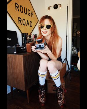Chloe Dykstra Instagram - This Rollergirl getup was my ORIGINAL 2020 HALLOWEEN COSTUME ™ but then while shooting this I definitely fell off the apple boxes and probably broke my coccyx so I had to put my skates away for a few weeks. So enjoy the few shots I took before I slammed ass on the hardwood floor and pounded my fist on the ground like the WAP dance to distract from searing pain
