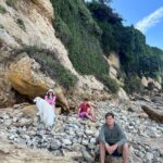 Christa Miller Instagram - Me making two of my boys sit and look for agates. In case it’s not evident, they are not thrilled…