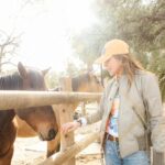 Christa Miller Instagram – Sometimes you just need to spend the day with horses and donkeys who want cookies and cuddles and then your heart is full 😊🍪 The work @skydogsanctuary does rescuing wild horses who’ve been rounded up by the BLM is absolutely amazing. Please check them out and support if you can! 🐴💛

📸 @catielaffoon