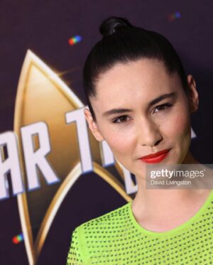 Christina Chong Instagram - Party Gorn Chic is what I was channeling. 

What a lovely day with the @startrek @startrekonpplus fam ending in the pool under a full moon dancing/swimming/lunging to @beyonce 

But Star Trek Day will now also be a day to celebrate the life of our Queen Elizabeth (see her in the last pic, in her own PGC). 

Rest in peace Her Majesty 🕊👑

💄@agostinamakeup
💇🏻‍♀️ @richardnormangrant
👗 @mrselfportrait 

#makethegornsexyagain