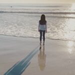 Christina Chang Instagram - Transitions. Cautiously I step into this year Feeling the weight of the last Renewal laps at my feet Every Breath I Take