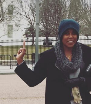 Christine Adams Instagram - This came up on my “memories” today.  Seems appropriate and may also qualify for the longest bird in history.
 NB I made my then 12yr old take this pic. 💙💙💙 💋#weflippedthesenate #2017 #mumoftheyear #impeachedtwice