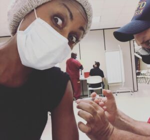 Christine Adams Instagram - I miss people watching and sitting at tables INSIDE looking at  peoples ACTUAL faces. I miss my mum and my friends and their kids. I miss being spontaneous and having people over. I miss random banter with strangers. I miss sitting at a bar and dancing in a sweaty club.  I miss bustling airports and packed theatres. I miss it all and I want it back. #drlynnsaysgetyourvaccine 👍🏾👌🏾💃🏾