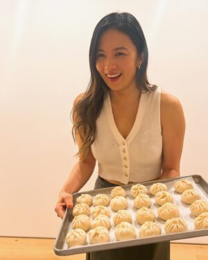 Christine Ko Instagram - I have a personal goal of learning how to cook all my fav dishes from childhood 🧡 Here’s what’s made the list so far:

- sheng jian bao (have yet to learn how to wrap them as beautifully as my mom’s that I’m holding) 
- braised pork shank 
- cold sesame noodles 
- hot and sour soup 
- stewed duck & mustard greens 
- the OG beef noodle soup 

Anyone wanna come over for din? 🙋🏻‍♀️